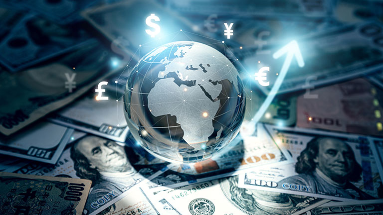 globe on top of money